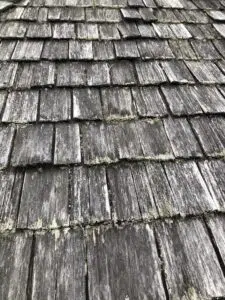 Old rotting and disintegrating cedar shingles in need of repair or replacement- Ontario Canada Maintenance guide